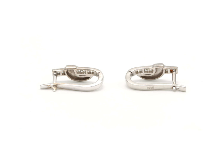 Boucles d'oreilles Boucles d'oreilles contemporaines en or blanc serties de diamants 58 Facettes B624