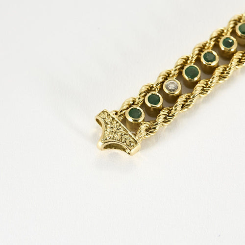 Elegant Bracelet en or jaune, diamants et émeraudes