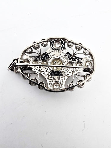 Broche Broche en or blanc sertie de diamants taille ancienne 58 Facettes