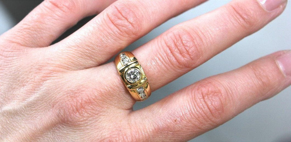 Bague 56 Bague Mixe Or jaune et Diamants (centre +/-0.55 Ct + 0.40 Ct Entourage) 58 Facettes