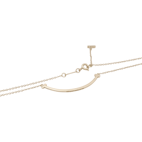 Collier Collier Tiffany & Co., "Tiffany T Smile", or jaune. 58 Facettes 35120
