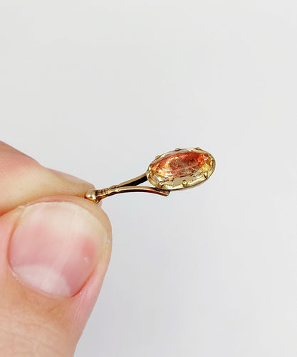 Pendentif Pendentif victorien or jaune, citrine sur paillon rouge (circa 1820) 58 Facettes A06126