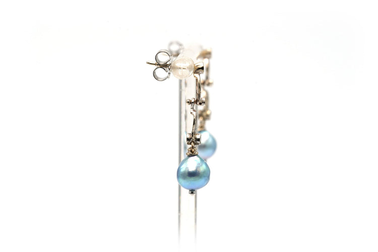 Boucles d'oreilles Boucles d'oreilles Art Nouveau en or blanc 18 carats serties de perles et de diamants 58 Facettes 22756
