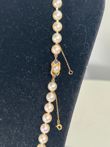 Collier Collier choker 63 perles fermoir or et saphir - 54.5cm 58 Facettes