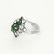 Bague 57 Bague en or blanc, diamants et émeraudes 58 Facettes CAN1416