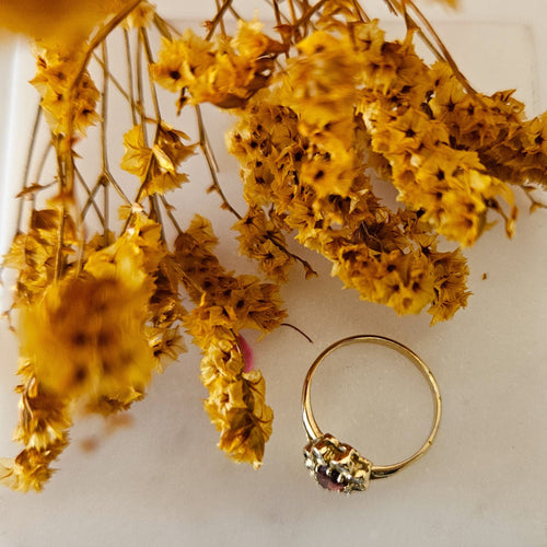 Bague Bague marguerite or jaune grenat diamants 58 Facettes MG3