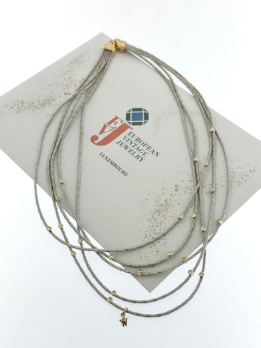 Collier Collier Wellendorff "Morgensonne" en or jaune et blanc avec diamants 58 Facettes