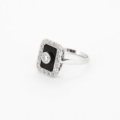 Bague 52 Bague or blanc, diamants et onyx 58 Facettes B250460