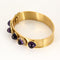 Bracelet Bracelet rigide or jaune et améthystes 58 Facettes PL05