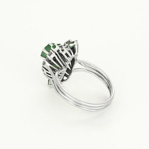 Bague 57 Bague en or blanc, diamants et émeraudes 58 Facettes CAN1416