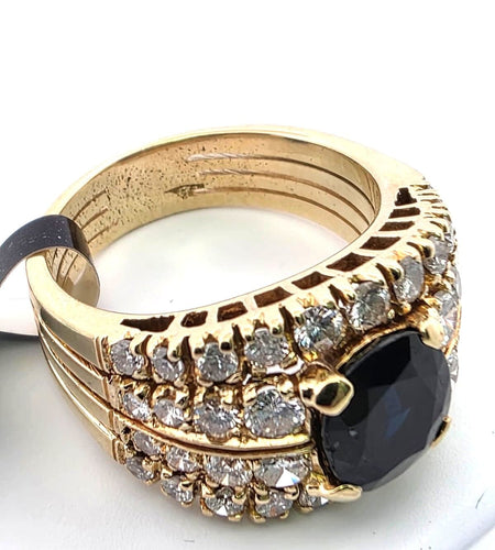 Anello oro giallo con zaffiro centrale e diamanti 58 Facettes