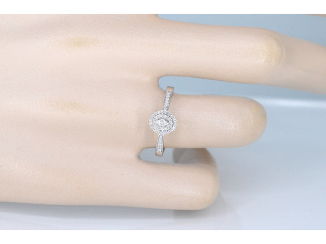 Bague entourage en or blanc avec diamants