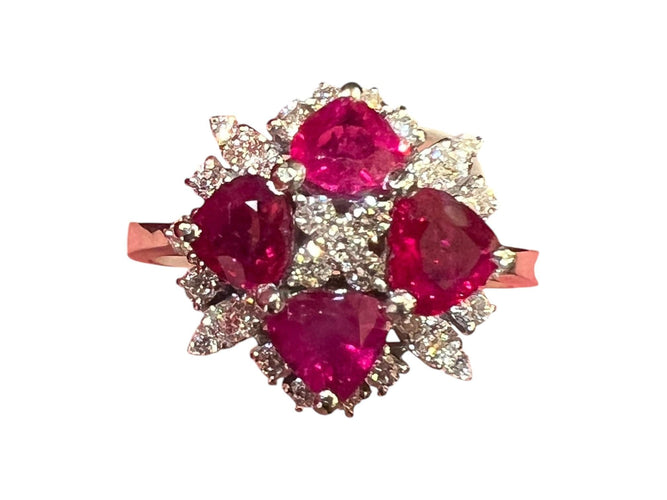 Bague Bague en or blanc 4  rubis taillés en coeur  et pavage de diamants 58 Facettes 7825 A