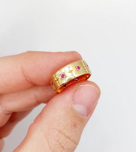 Large bague jonc Art Déco or rose, rubis sertis étoilés (circa 1950)
