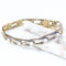 Bracelet Bracelet vintage orné de diamants, de saphirs et de perles 58 Facettes J010000311