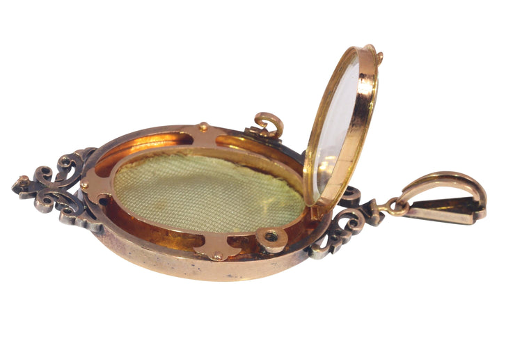 Pendentif Polyvalence victorienne : une broche-pendentif en diamant de 1850 58 Facettes 22112-0187