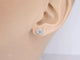 Boucles d'oreilles Boucles d'oreilles en or blanc avec diamants taille brillant 58 Facettes 2075