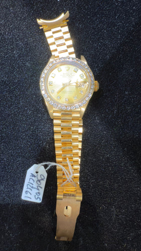 Montre Rolex Oyster perpetual Lady en or et diamants 58 Facettes