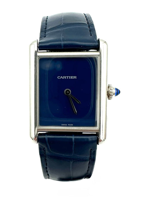 Montre CARTIER. Montre TANK MUST acier. 58 Facettes