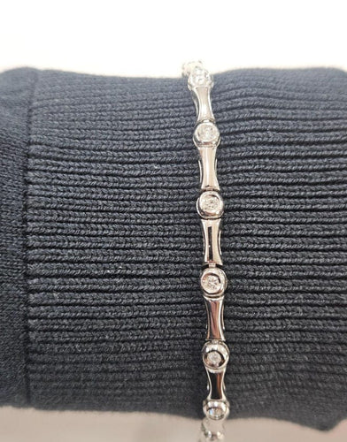 Bracelet Bracelet design contemporain en or avec diamants 58 Facettes Q263B(99)