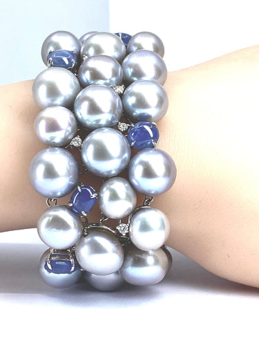 Bracelet Important bracelet or blanc, saphirs étoilés, diamants et perles grises 58 Facettes AB632