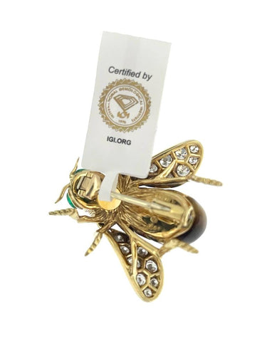 Broche Broche or jaune et pierres précieuses signé René Kreiss 58 Facettes