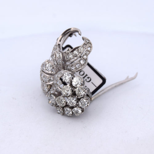 Broche Broche ancienne en or blanc 18 carats 58 Facettes
