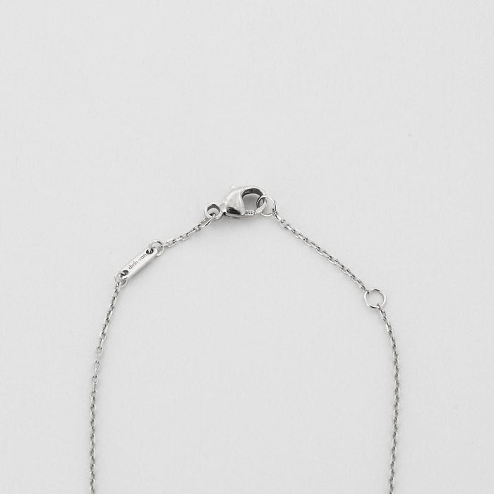 Collier DINH VAN - collier menottes R8 or gris et diamants 58 Facettes