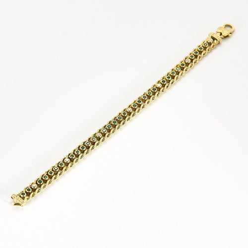 Bracelet Elegant Bracelet en or jaune, diamants et émeraudes 58 Facettes B250662