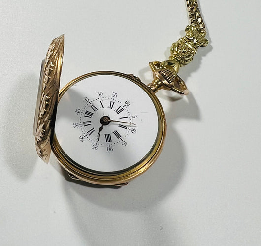 Montre Montre de col émaillé et sa chaîne en or jaune 58 Facettes 226