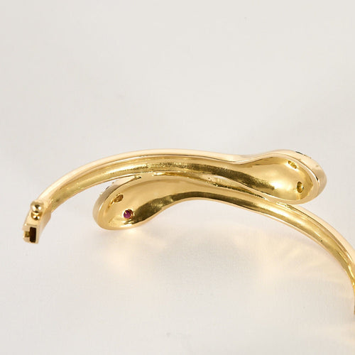 Bracelet Bracelet "Serpent" en or jaune, rubis et émeraudes 58 Facettes BIA1213