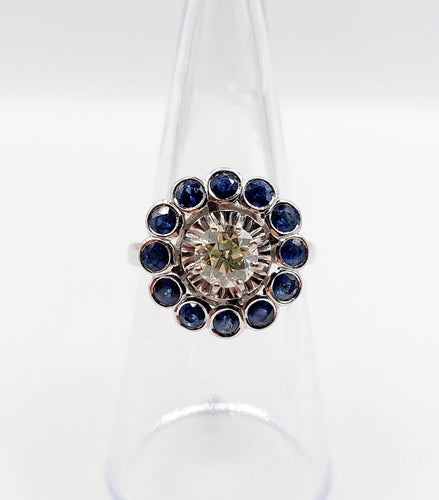 Bague 51.5 Bague marguerite Art Déco or blanc, diamant taille ancienne 0,65 carat et saphirs 58 Facettes A06329