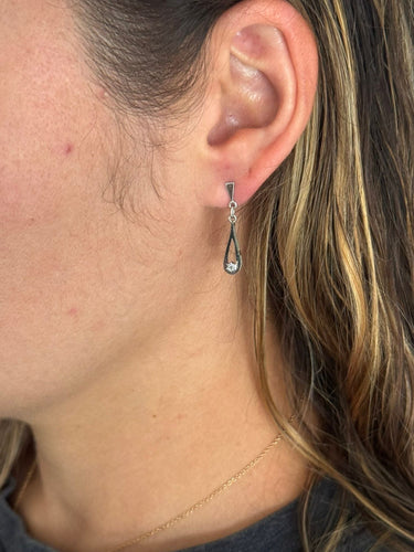 Paire de boucle d’oreille en or blanc et diamants