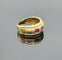Bague 55 Bague style jarretière en or jaune sertie de rubis et diamant 58 Facettes