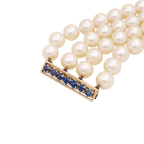 Bracelet Bracelet perles de culture 4 rangs, or jaune, saphirs. 58 Facettes 34535