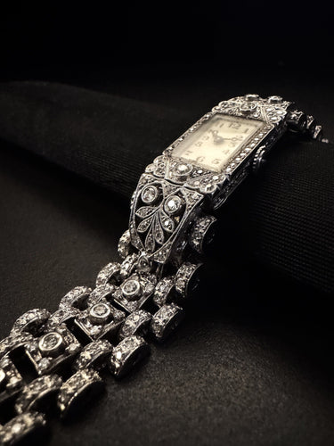 Montre montre Art Déco en platine et or blanc 58 Facettes