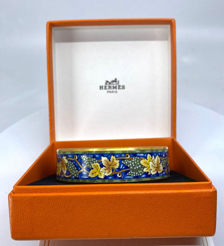 Bracelet HERMÈS - bracelet en métal doré et émail 58 Facettes AB657
