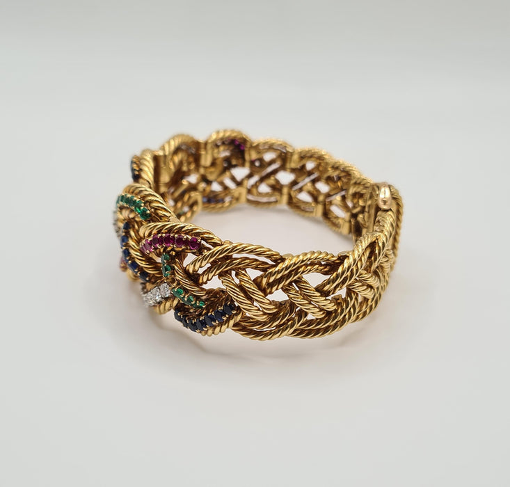 Boucheron - Bracelet en or jaune serti de diamants, saphirs, émeraudes et rubis