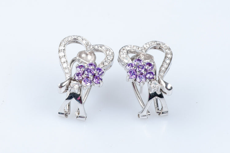 Bague Bague coeurs et fleurs en or blanc 18 carats 58 Facettes 111.20995-53