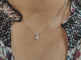 Collier Collier pendentif diamant poire 0,45ct en or blanc 58 Facettes 33409