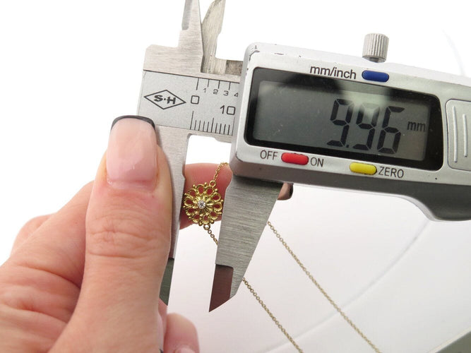 Collier collier ILIAS LALAOUNIS rosette 526005 diamants 0.02ct en or jaune 18k 58 Facettes 270148