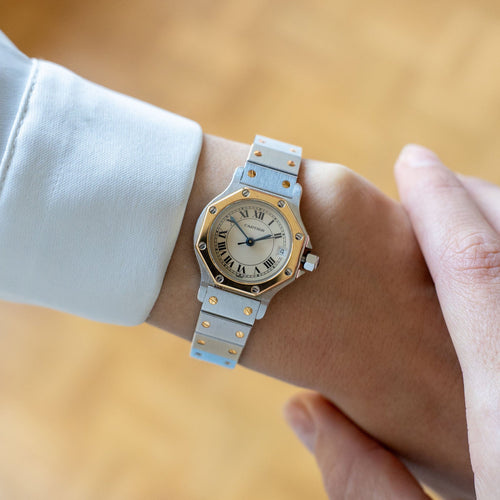Montre Cartier - Montre Santos Octagone cadran crème chiffres romains acier et or jaune 58 Facettes