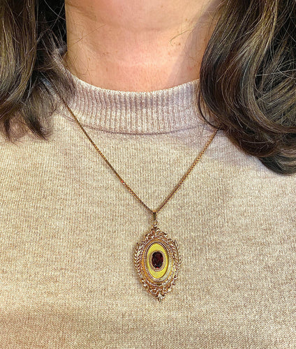 Pendentif Pendentif porte souvenir ouvrant en or et grenat 58 Facettes AB574