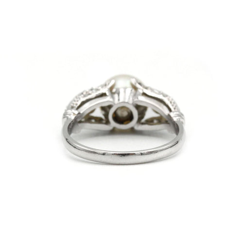 Bague 52 Bague or, diamants et perle 58 Facettes 1150