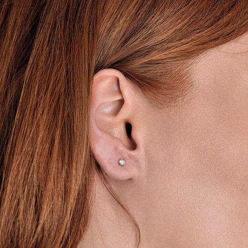 Paire de boutons d'oreilles en or gris et diamants