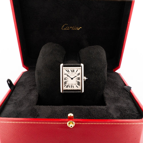 Montre Cartier - Montre Tank Must Medium cadran ivoire chiffres romains 58 Facettes