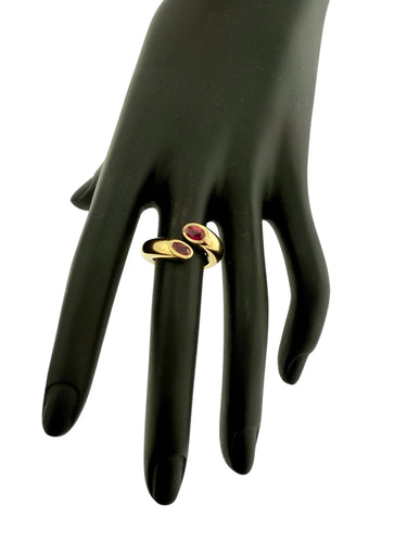 CARTIER - Bague Ellipse en or jaune Deux têtes croisées avec rubis