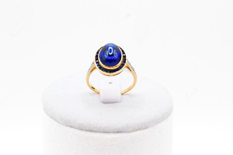 Bague Bague or jaune, platine, saphir cabochon 58 Facettes 250101