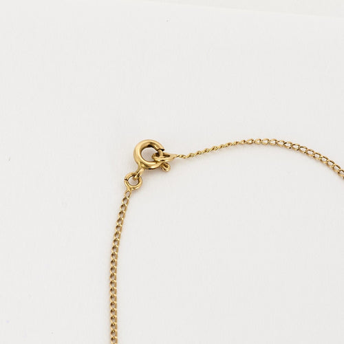 AUGIS - Chaîne retenant une Médaille d'amour en or jaune