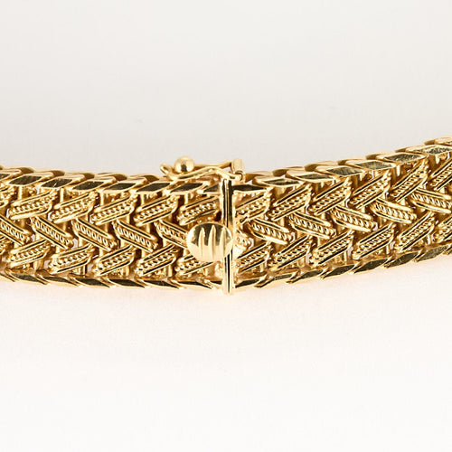 Collier Collier négligé en or jaune tressé 58 Facettes MON0828